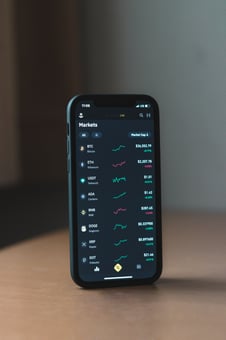 Phone Screen showing investment performance