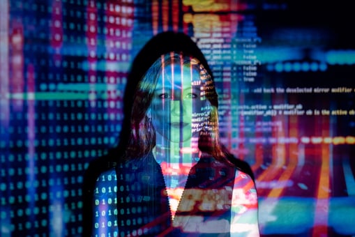 Woman with screens and data overlaid on her image